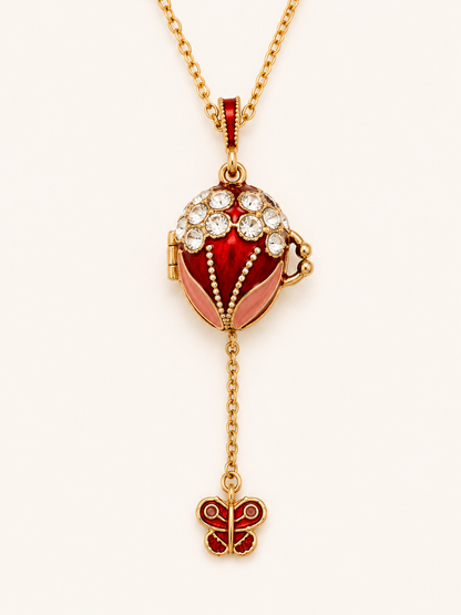 Collar Huevo Fabergé Rojo con Mariposa Secreta