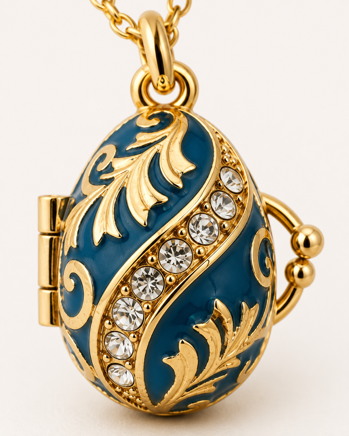 Collar con dije relicario Huevo Imperial Azul con Detalles Dorados