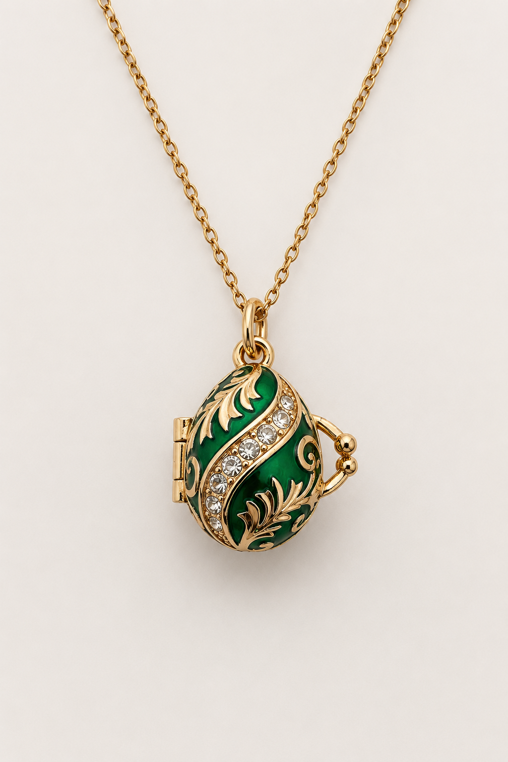 Dije Huevo Imperial Verde con Campana Sorpresa