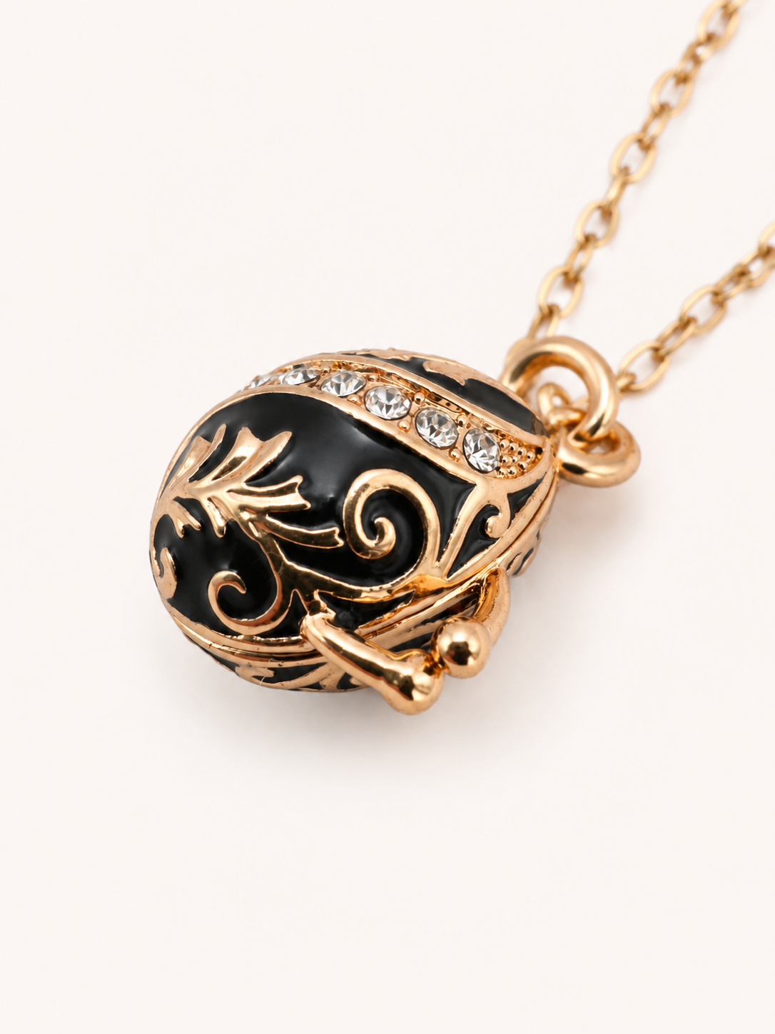 Collar con Relicario Huevo Fabergé Negro con Campana Interior – AKM San Petersburgo (Copy)