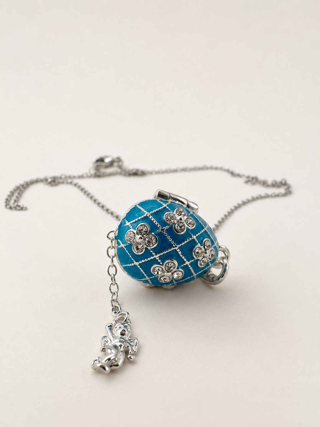 Dije Huevo Fabergé Azul con Ángel
