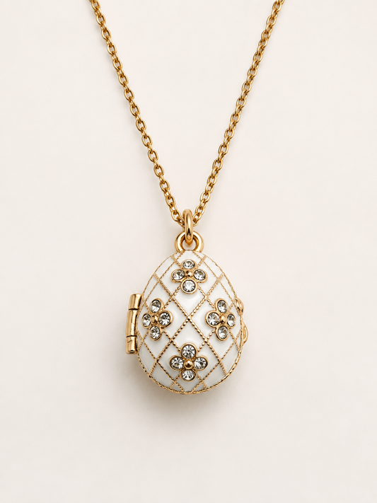 Dije Huevo Fabergé Blanco con Ángel