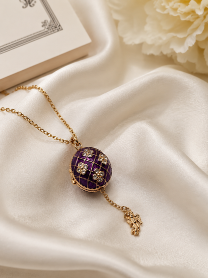 Dije Huevo Fabergé Morado con Ángel