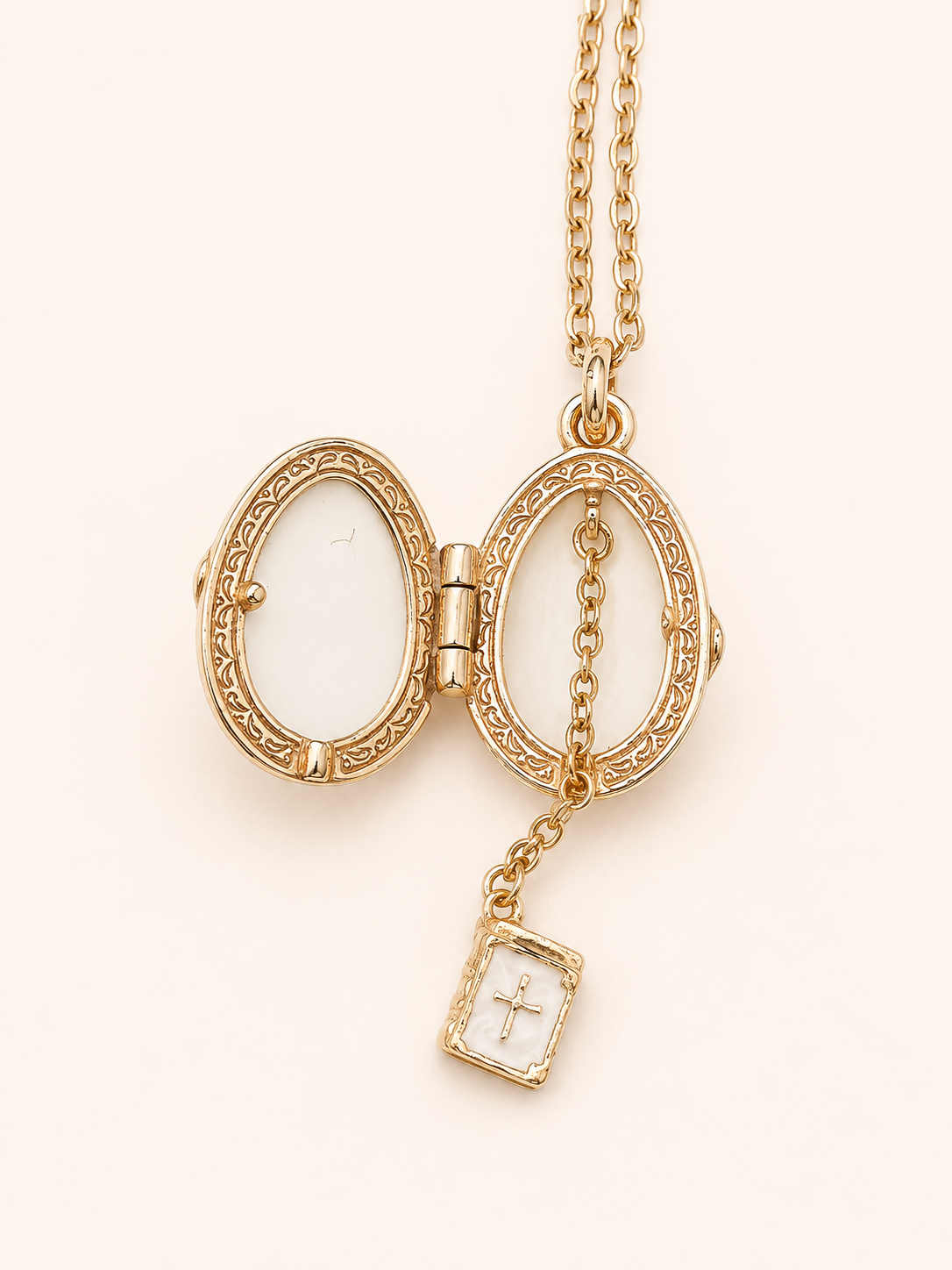 Dije Huevo Fabergé Blanco con Biblia