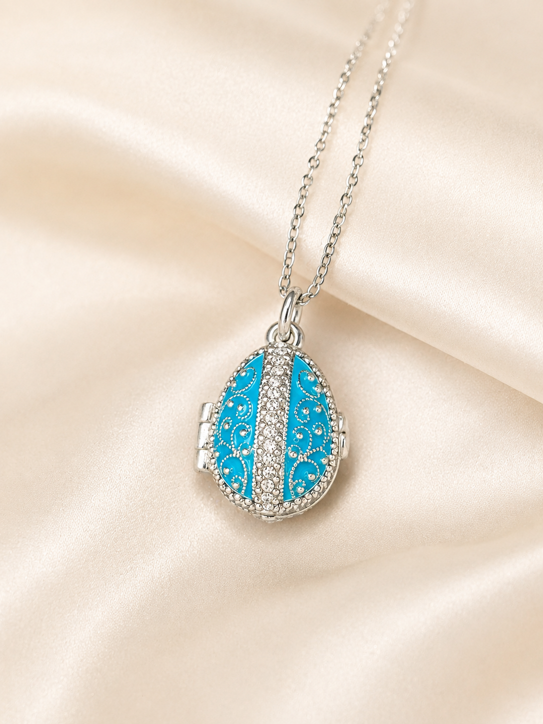 Dije Huevo Fabergé Azul con Sorpresa de Manzana