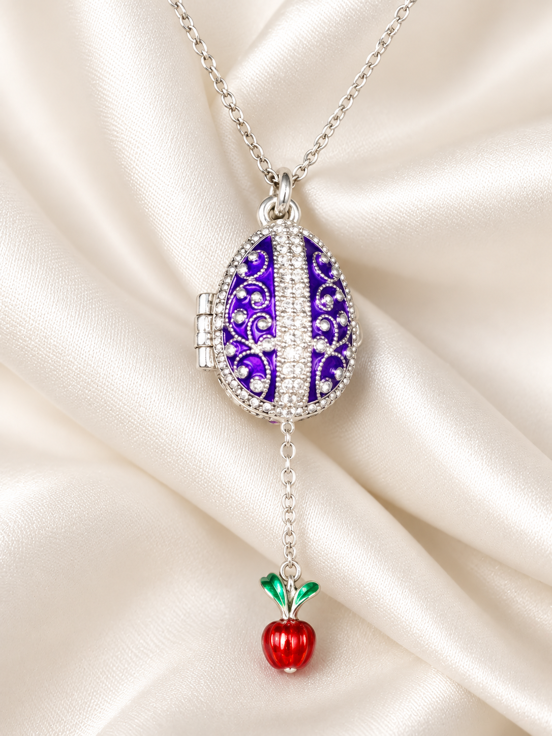 Dije Huevo Fabergé Morado con Sorpresa de Manzana