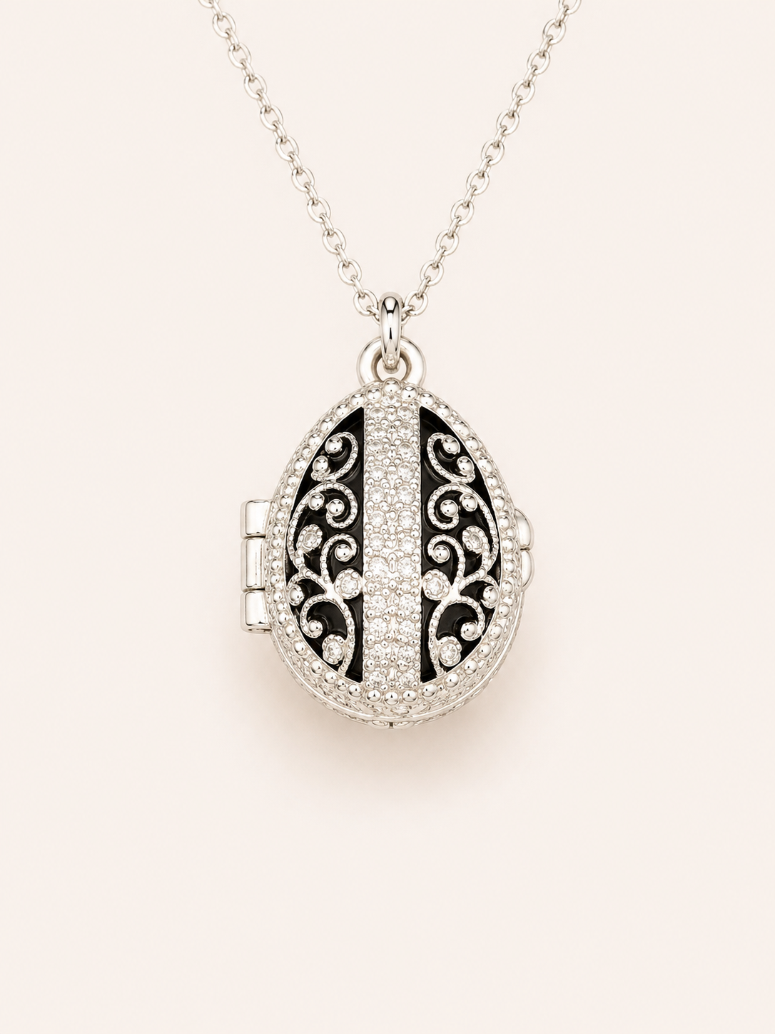 Dije Huevo Fabergé Negro con Sorpresa de Manzana