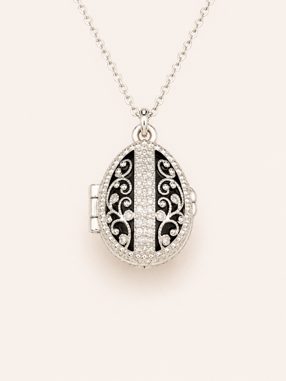 Dije Huevo Fabergé Negro con Sorpresa de Manzana