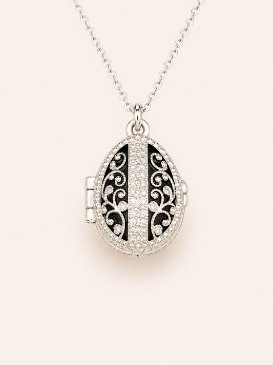 Dije Huevo Fabergé Negro con Sorpresa de Manzana
