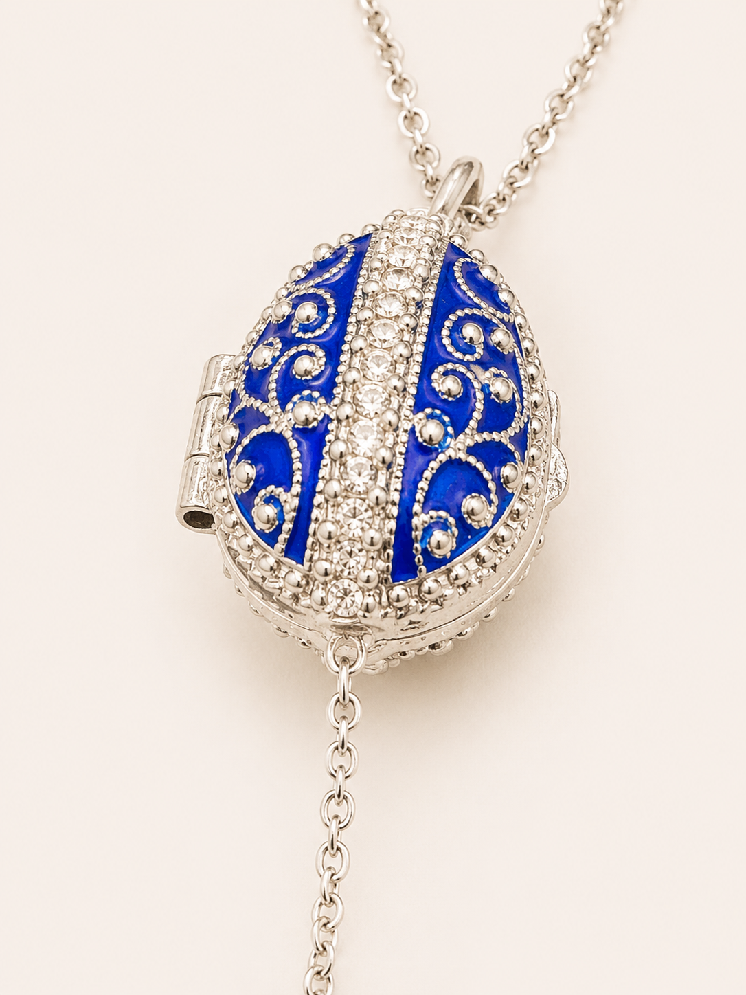 Dije Huevo Fabergé Azul con Sorpresa de Manzana